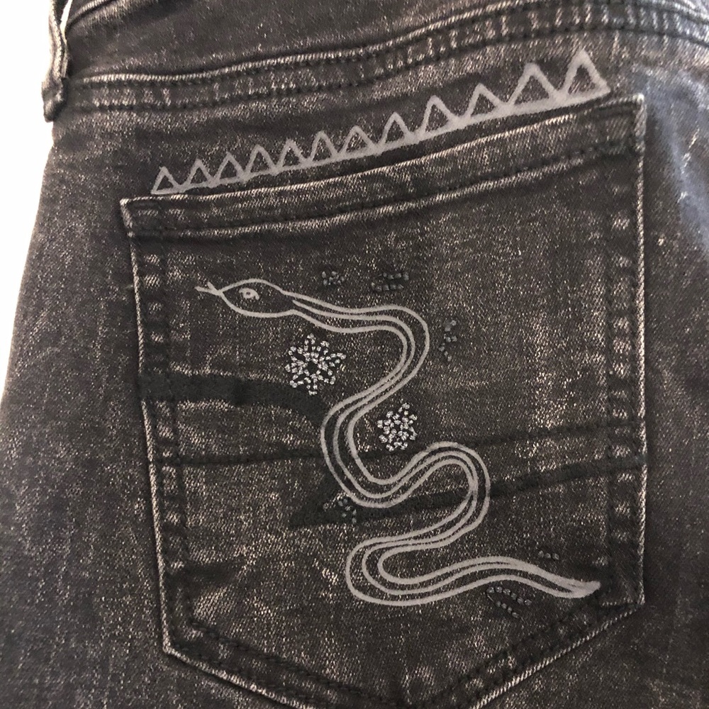 American Eagle size 6 black design skinny jeans.